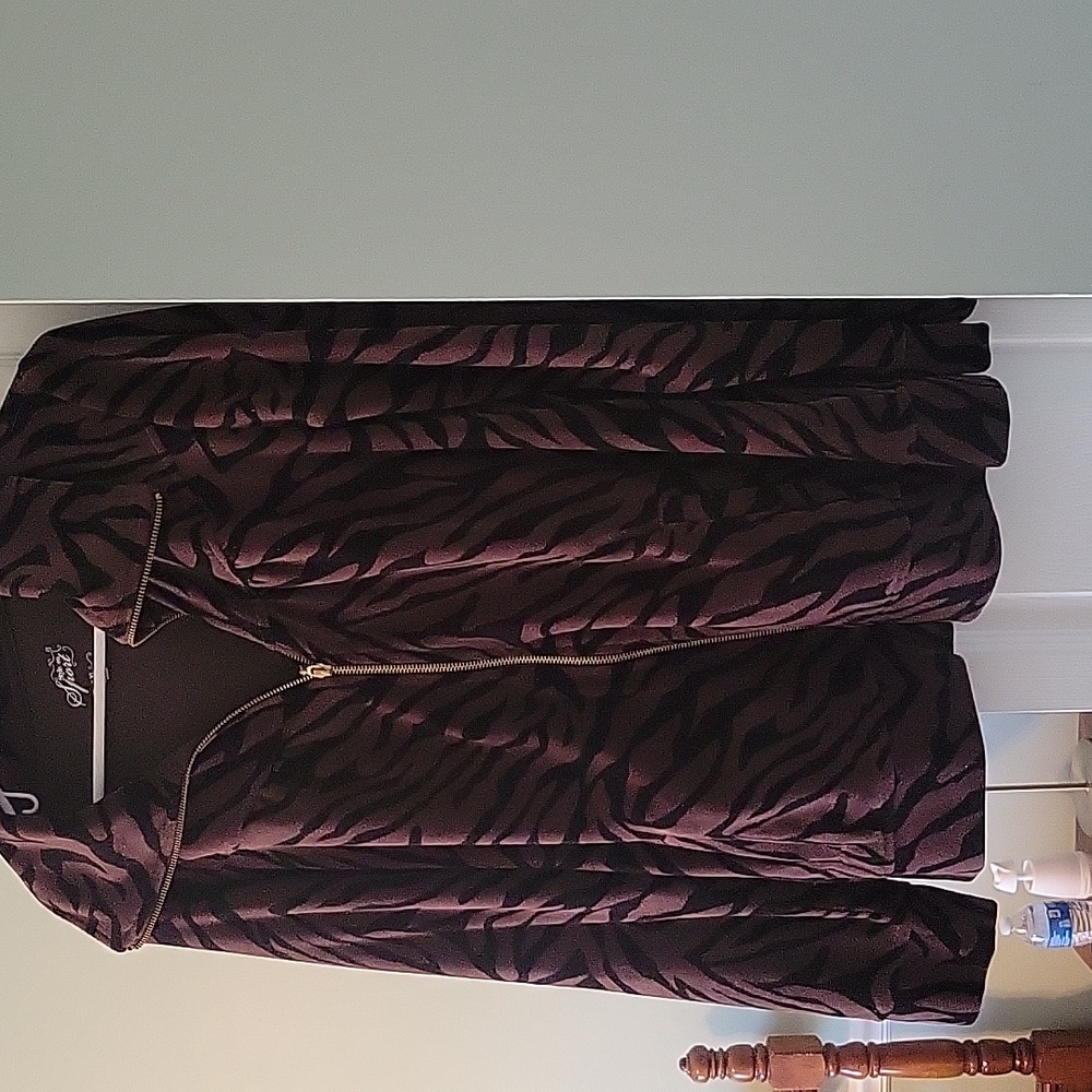Size extra large animal print jacket  gently used